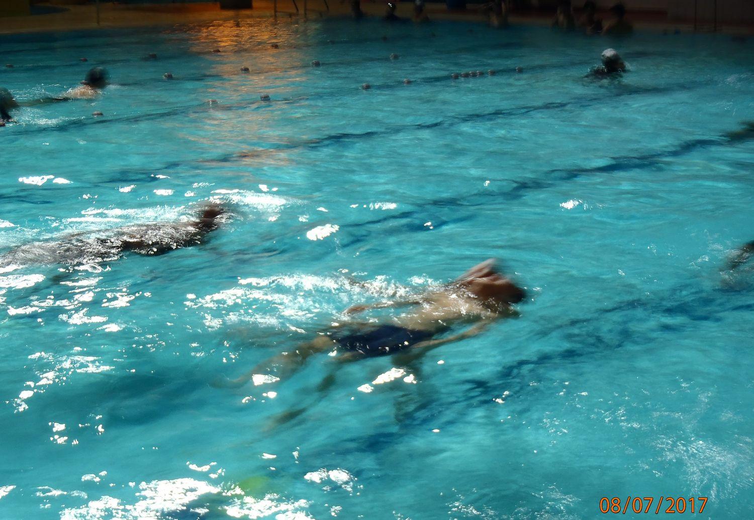 A swimmer mid-stroke during lane practice