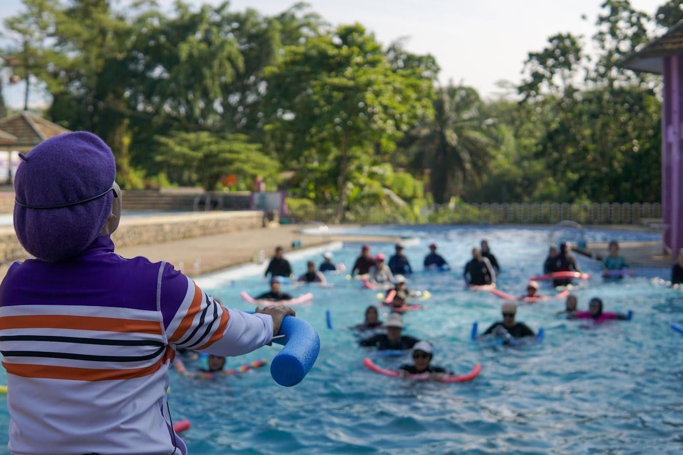 Senior citizens swimming lesson